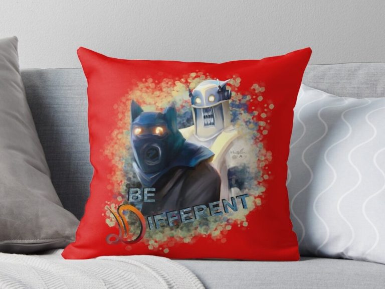 Pillow showing two funny robots and the words „Be different“